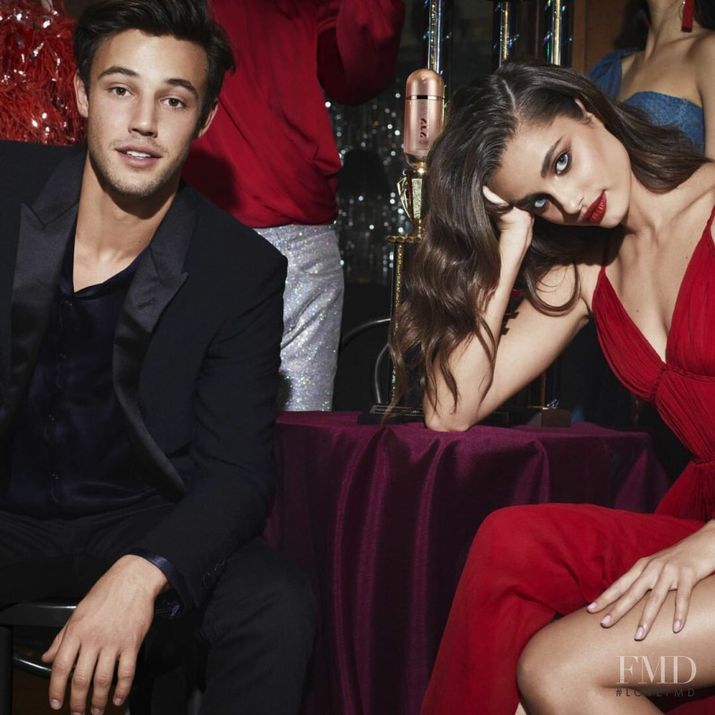 Taylor Hill featured in  the Carolina Herrera 212 Vip Fragrance advertisement for Spring/Summer 2019