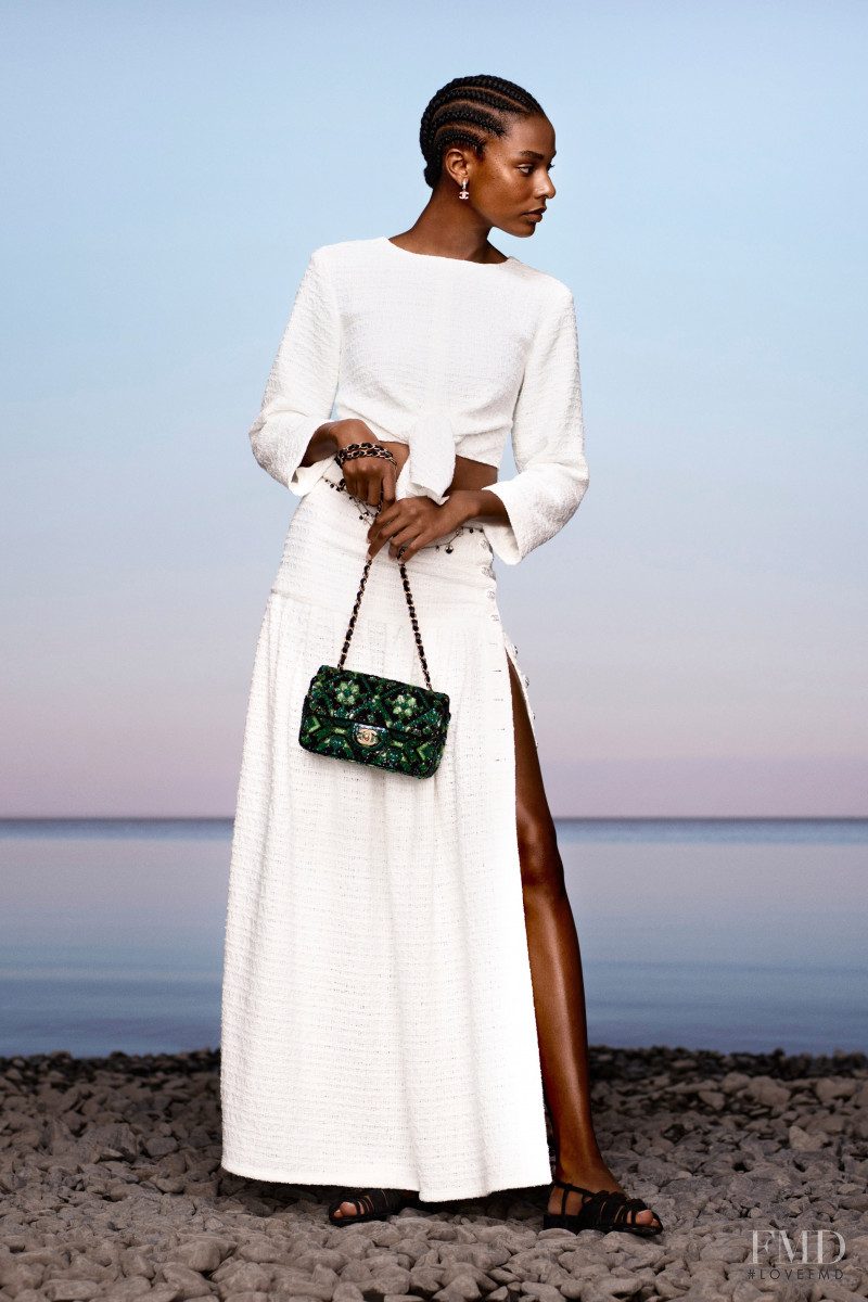 Karly Loyce featured in  the Chanel lookbook for Resort 2021