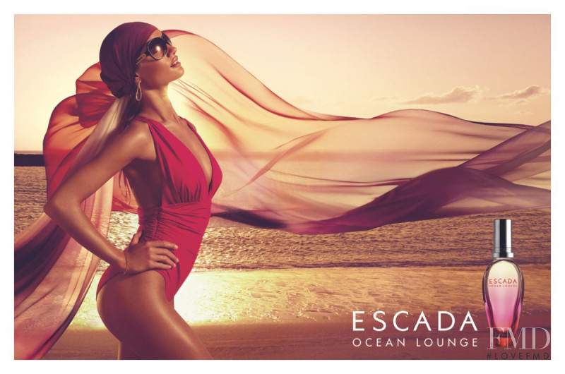 Rosie Huntington-Whiteley featured in  the Escada Ocean Lounge Fragrance advertisement for Spring/Summer 2009