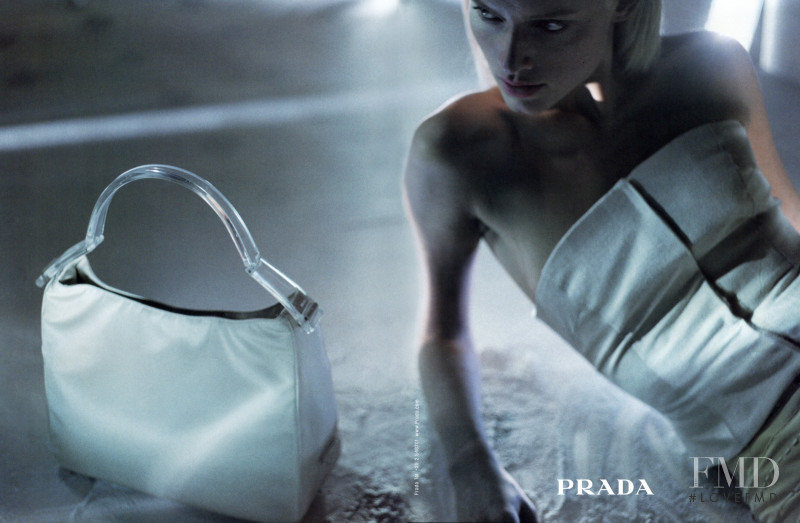 Amber Valletta featured in  the Prada advertisement for Spring/Summer 1998