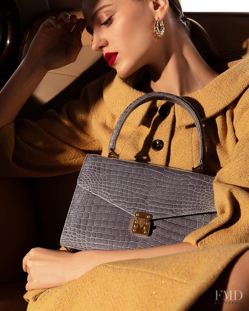 Natalia Bulycheva featured in  the Ulyana Sergeenko Exotic Leather Goods Collection advertisement for Spring/Summer 2020