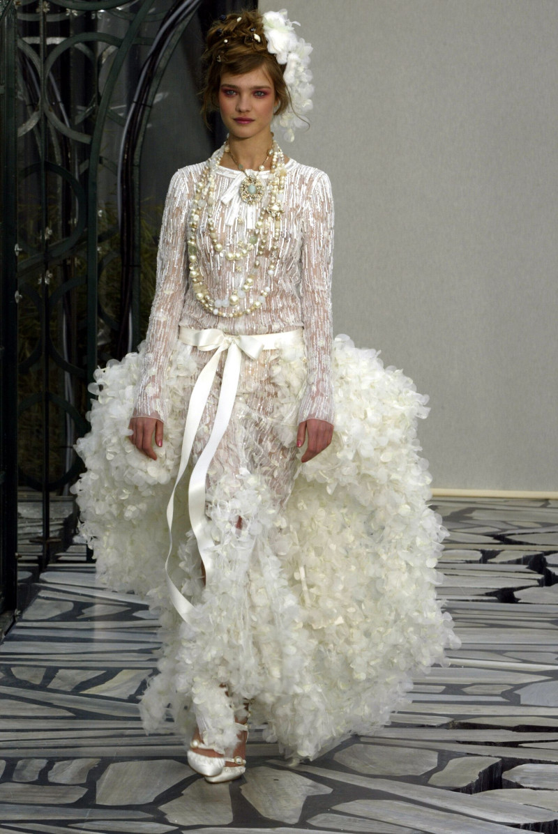Natalia Vodianova featured in  the Chanel Haute Couture fashion show for Spring/Summer 2003