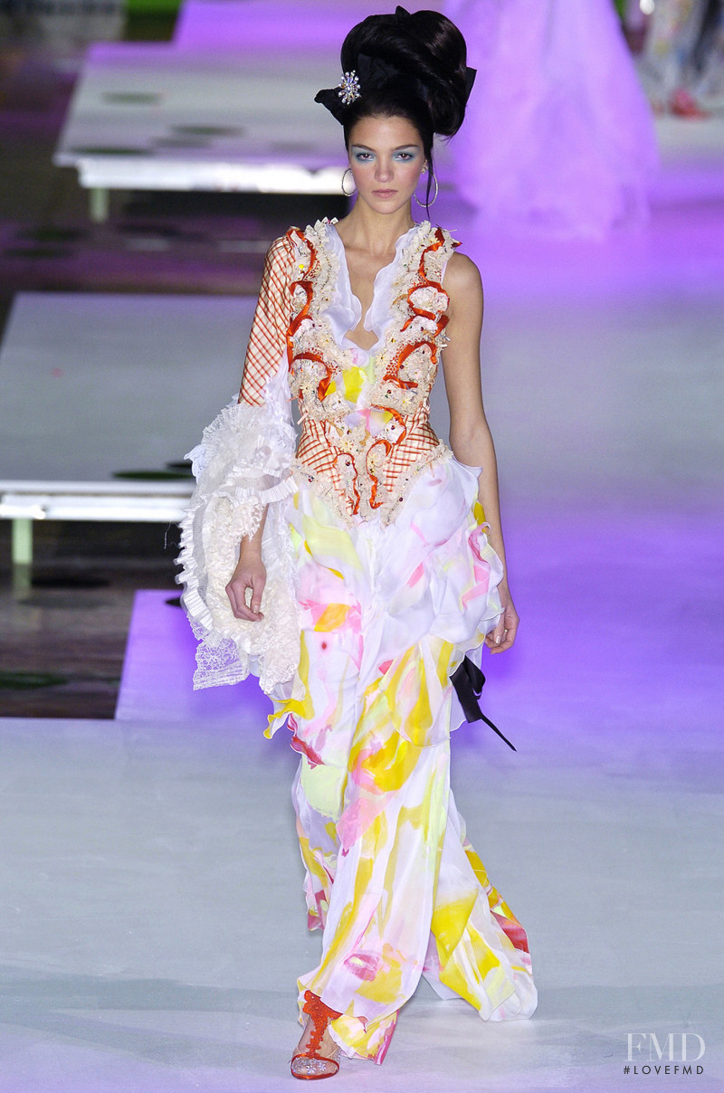 Mariacarla Boscono featured in  the Christian Lacroix Couture fashion show for Spring/Summer 2004