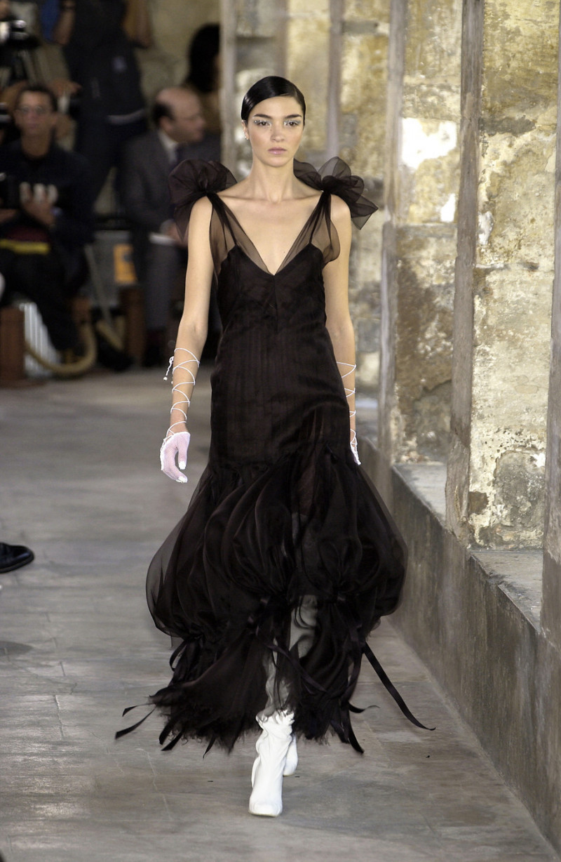 Mariacarla Boscono featured in  the Chanel Haute Couture fashion show for Autumn/Winter 2003