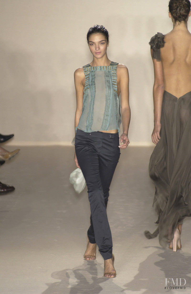 Mariacarla Boscono featured in  the Stella McCartney fashion show for Spring/Summer 2004