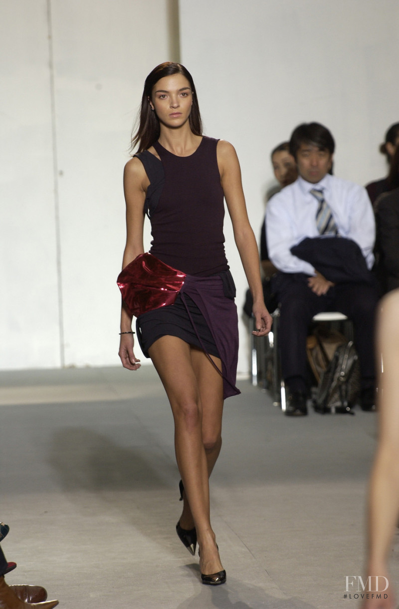 Mariacarla Boscono featured in  the Helmut Lang fashion show for Spring/Summer 2004