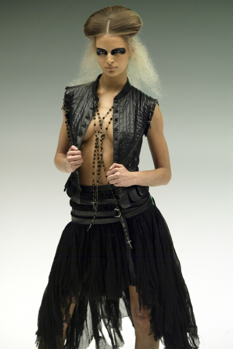 Karolina Kurkova featured in  the Alexander McQueen fashion show for Spring/Summer 2003