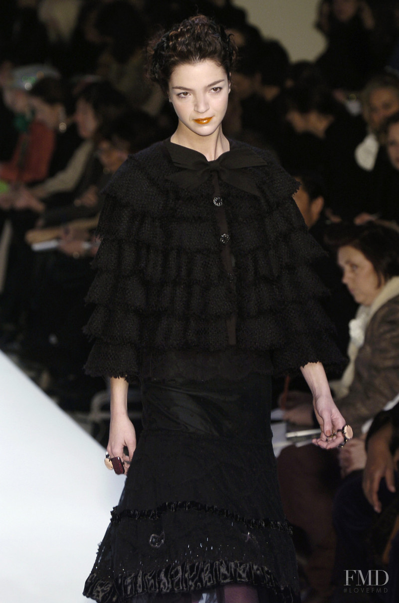 Mariacarla Boscono featured in  the Moschino fashion show for Autumn/Winter 2004