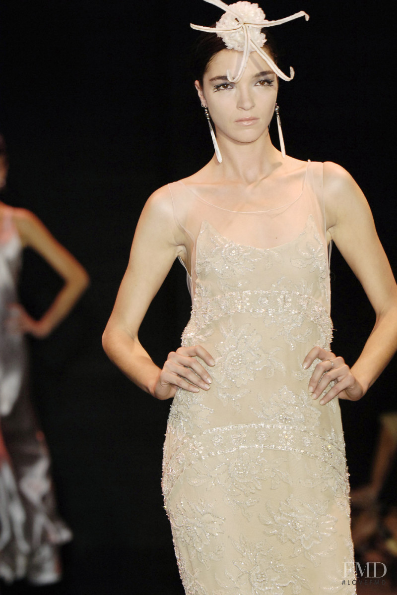 Mariacarla Boscono featured in  the Armani Prive fashion show for Autumn/Winter 2005