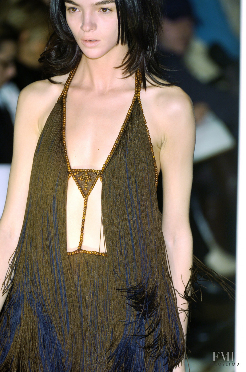 Mariacarla Boscono featured in  the Hussein Chalayan fashion show for Autumn/Winter 2005