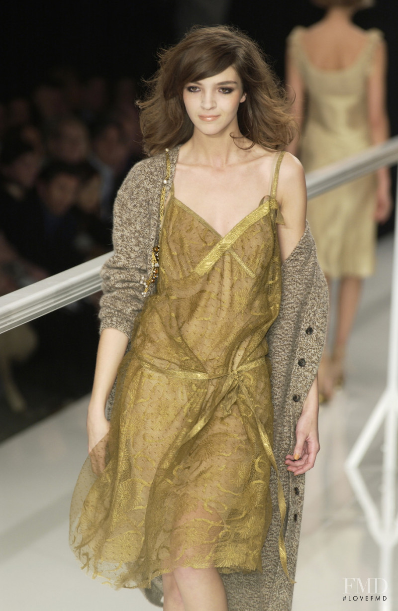Mariacarla Boscono featured in  the Moschino fashion show for Autumn/Winter 2002
