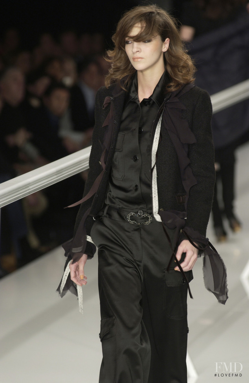 Mariacarla Boscono featured in  the Moschino fashion show for Autumn/Winter 2002