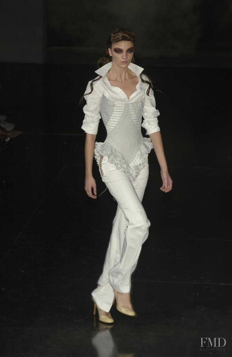 Mariacarla Boscono featured in  the Alexander McQueen fashion show for Spring/Summer 2002