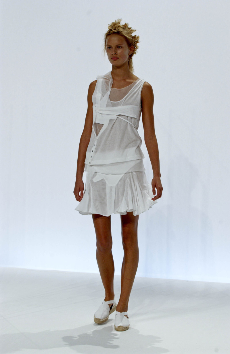 Karolina Kurkova featured in  the Hussein Chalayan fashion show for Spring/Summer 2002