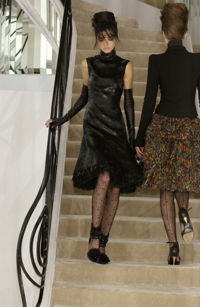 Mariacarla Boscono featured in  the Chanel Haute Couture fashion show for Autumn/Winter 2002