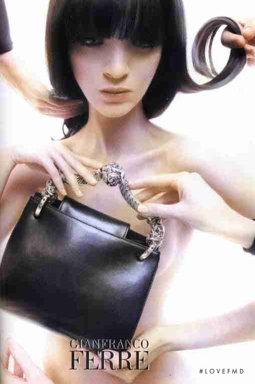 Mariacarla Boscono featured in  the Gianfranco Ferré advertisement for Autumn/Winter 2003