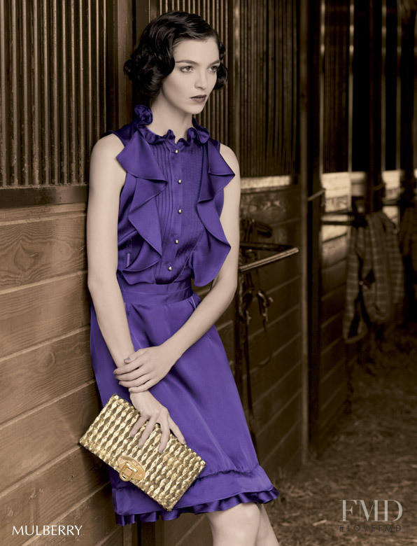 Mariacarla Boscono featured in  the Americana Manhasset (RETAILER) lookbook for Holiday 2007