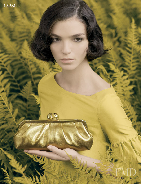 Mariacarla Boscono featured in  the Americana Manhasset (RETAILER) lookbook for Holiday 2007