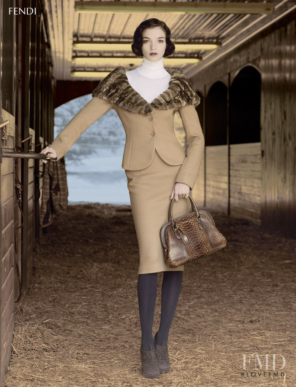 Mariacarla Boscono featured in  the Americana Manhasset (RETAILER) lookbook for Holiday 2007