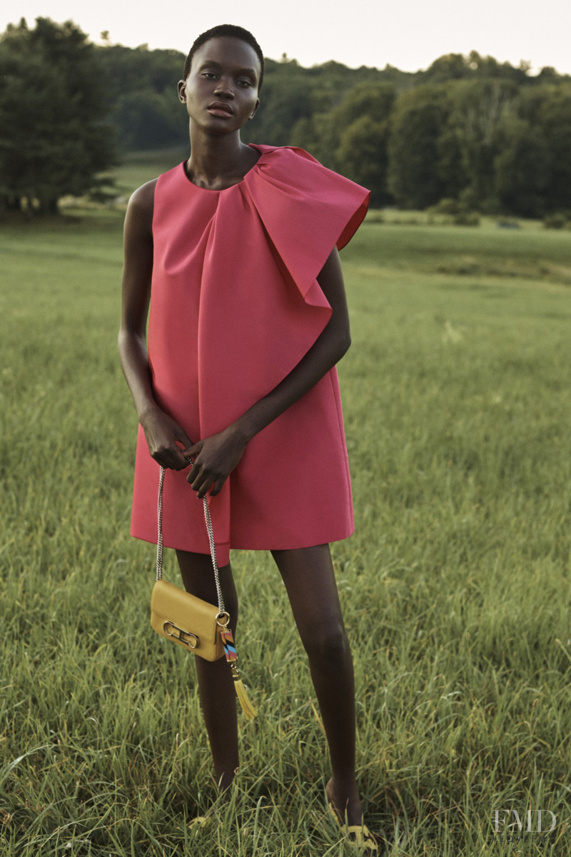 Achenrin Madit featured in  the Carolina Herrera lookbook for Resort 2021