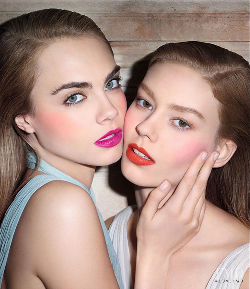 Cara Delevingne featured in  the YSL Beauty advertisement for Spring/Summer 2014