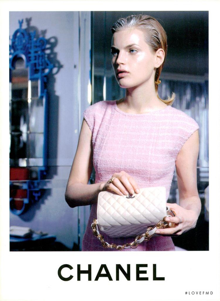Guinevere van Seenus featured in  the Chanel advertisement for Cruise 1996