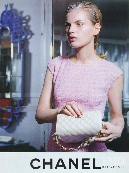 Guinevere van Seenus featured in  the Chanel advertisement for Autumn/Winter 1996