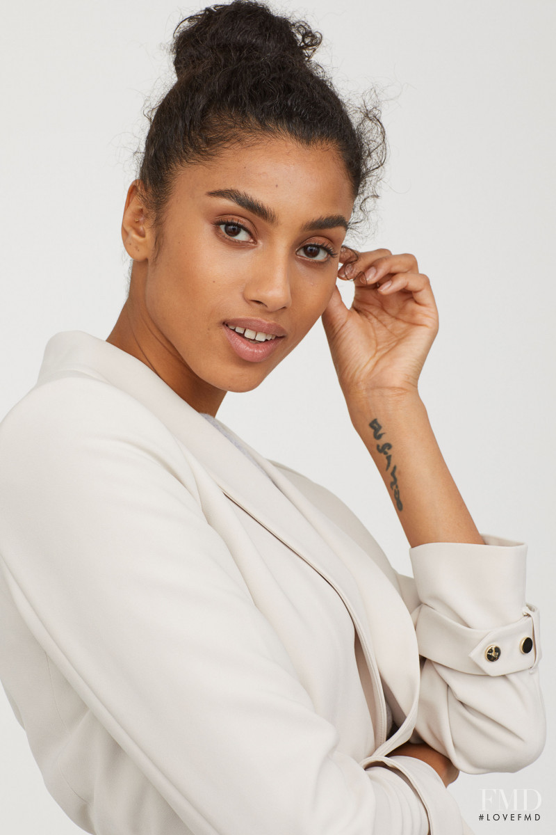 Imaan Hammam featured in  the H&M catalogue for Pre-Fall 2018