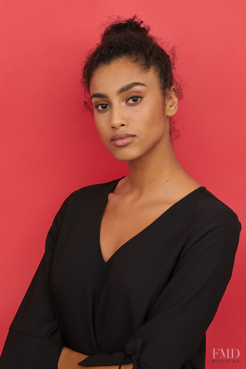 Imaan Hammam featured in  the H&M catalogue for Pre-Fall 2018