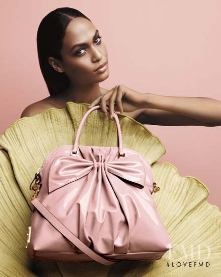 Joan Smalls featured in  the Neiman Marcus advertisement for Resort 2010