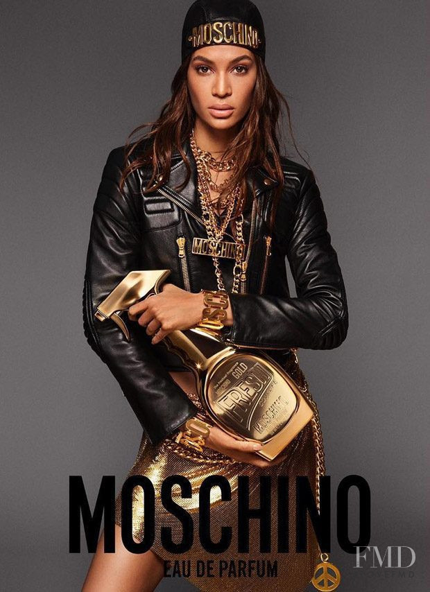 Joan Smalls featured in  the Moschino by Allison Gold Fresh Fragrance advertisement for Holiday 2017