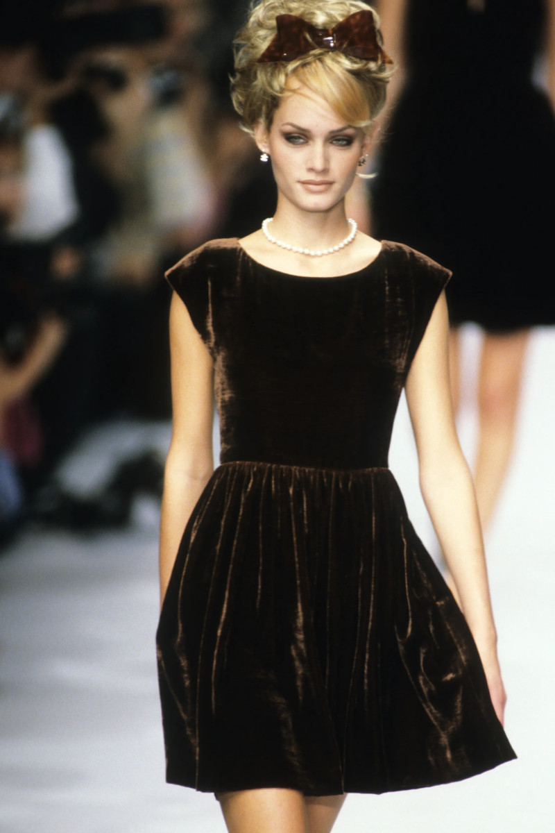 Amber Valletta featured in  the Chanel fashion show for Spring/Summer 1996