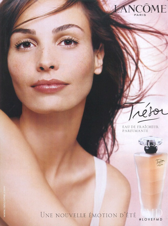 Ines Sastre featured in  the Lancome Ttesor Fragrance advertisement for Spring/Summer 2002