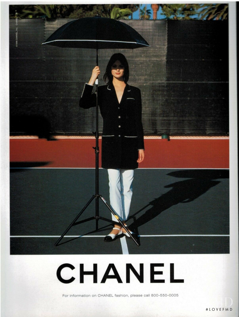 Amber Valletta featured in  the Chanel advertisement for Spring/Summer 1996