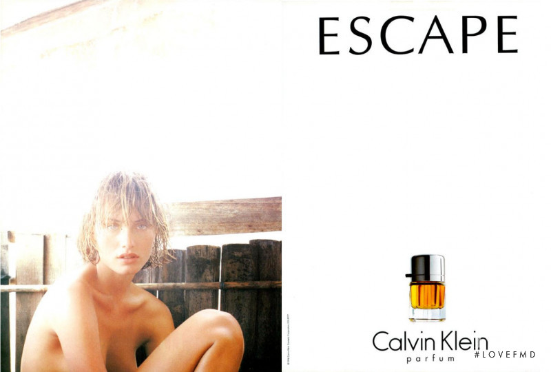 Amber Valletta featured in  the Calvin Klein Fragrance Escape advertisement for Spring/Summer 1994