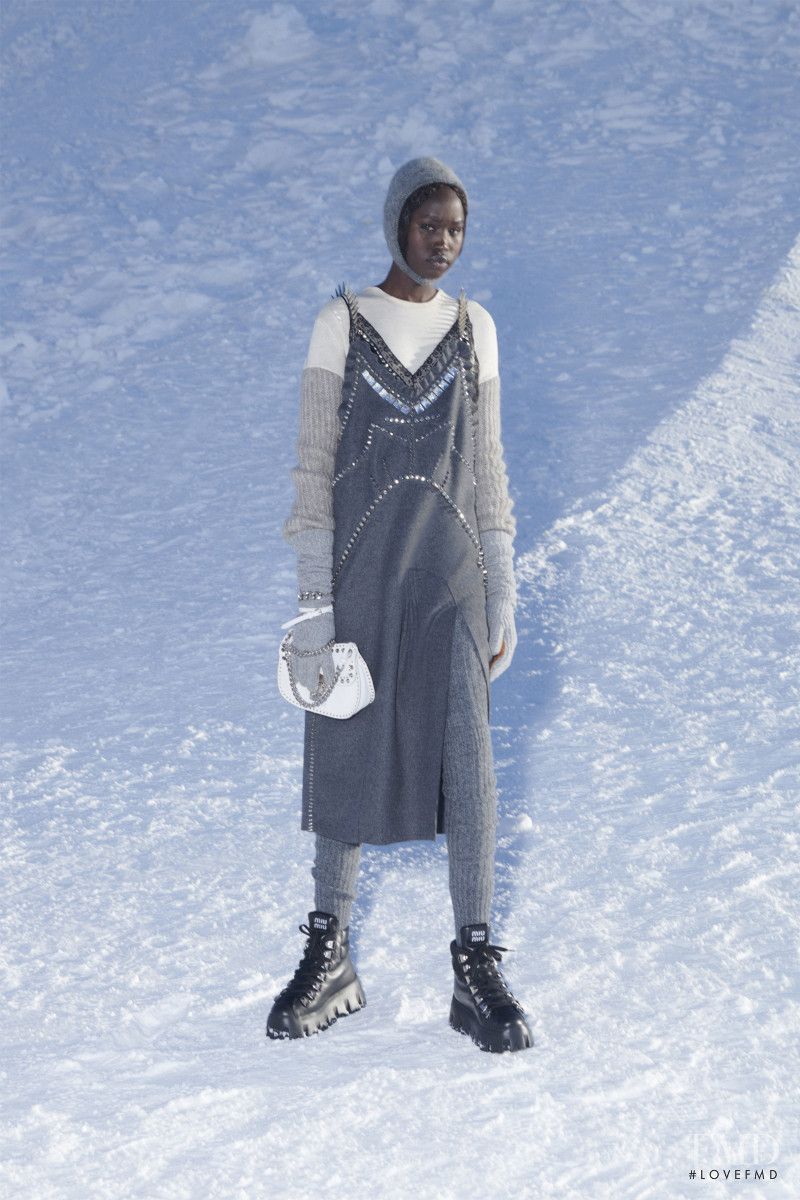Adit Priscilla featured in  the Miu Miu fashion show for Autumn/Winter 2021