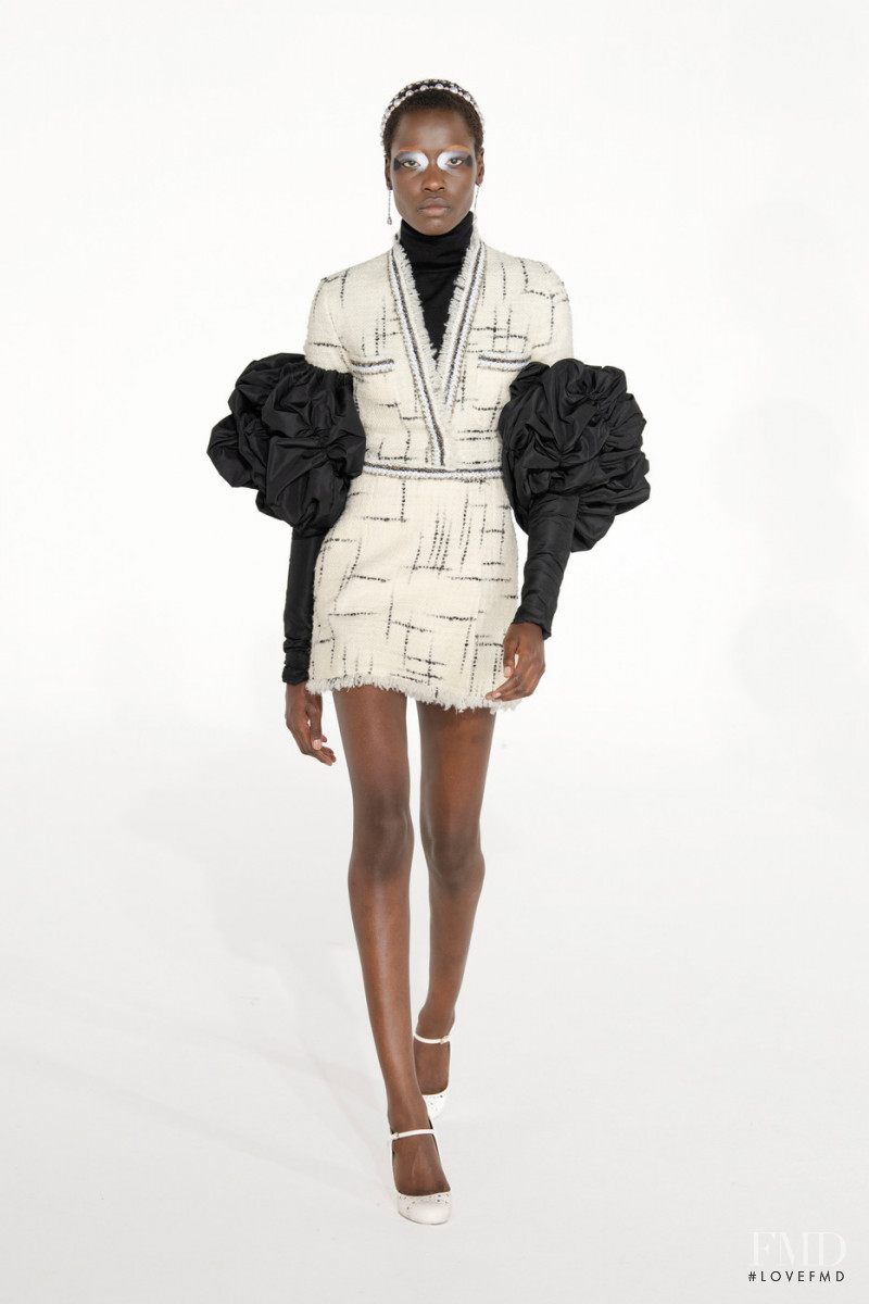 Awar Odhiang featured in  the Giambattista Valli fashion show for Autumn/Winter 2021