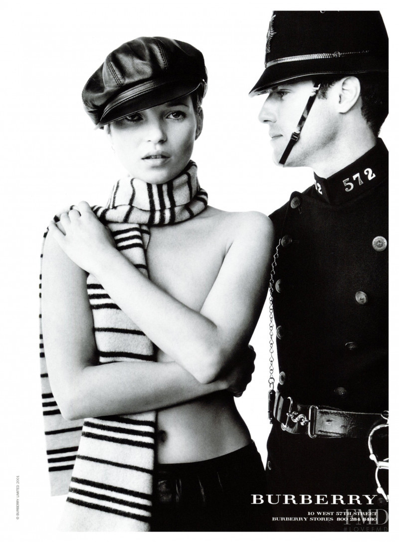 Kate Moss featured in  the Burberry advertisement for Autumn/Winter 2001