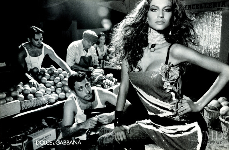 Gisele Bundchen featured in  the Dolce & Gabbana advertisement for Spring/Summer 2000