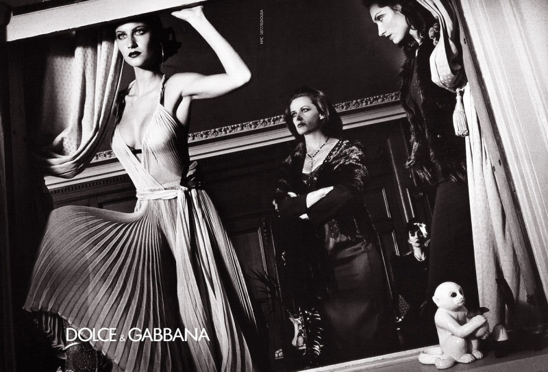 Gisele Bundchen featured in  the Dolce & Gabbana advertisement for Autumn/Winter 2000