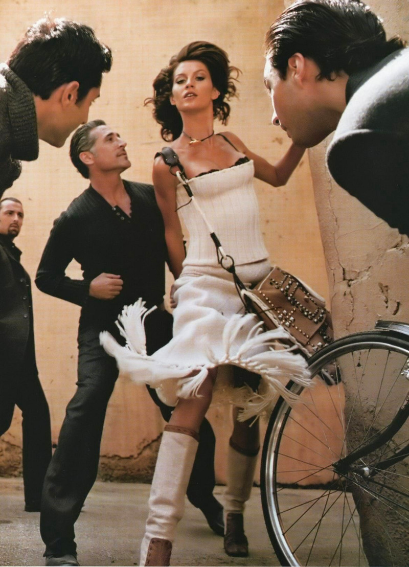 Gisele Bundchen featured in  the Dolce & Gabbana advertisement for Autumn/Winter 2002