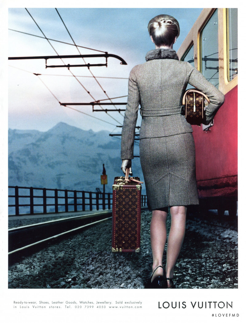 Eva Herzigova featured in  the Louis Vuitton advertisement for Autumn/Winter 2002