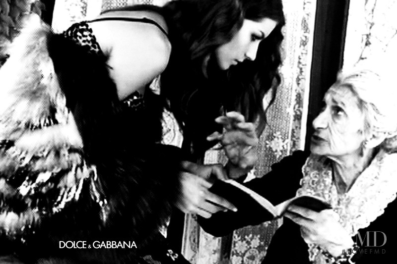 Gisele Bundchen featured in  the Dolce & Gabbana advertisement for Autumn/Winter 1999