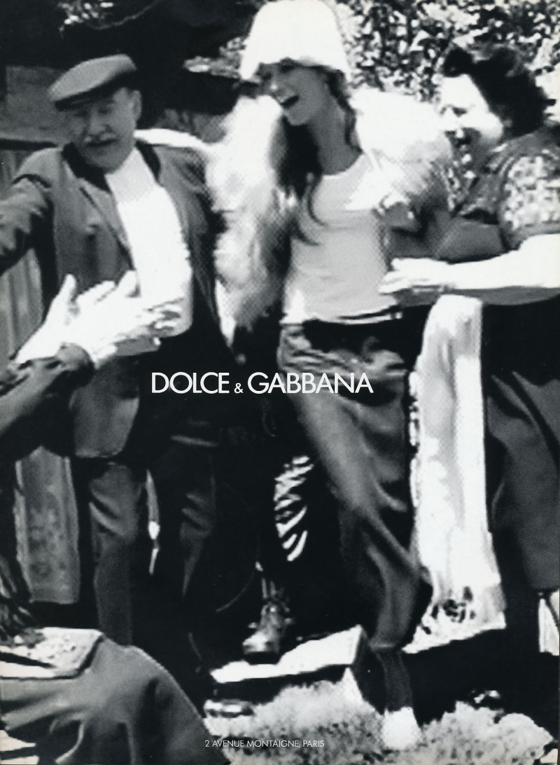 Gisele Bundchen featured in  the Dolce & Gabbana advertisement for Autumn/Winter 1999