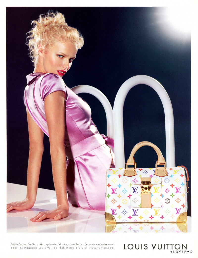 Eva Herzigova featured in  the Louis Vuitton advertisement for Spring/Summer 2003