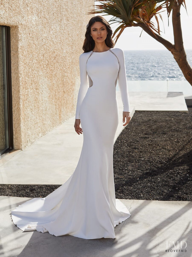 Victoria Bronova featured in  the Pronovias Première Collection II catalogue for Autumn/Winter 2020