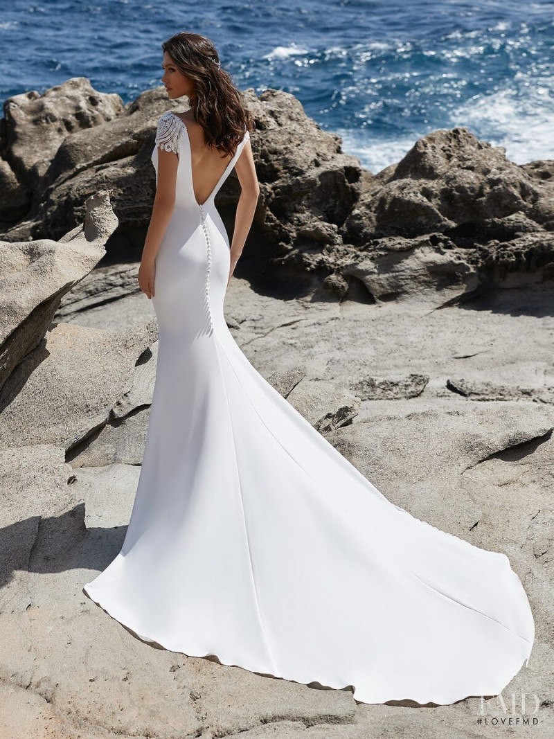 Victoria Bronova featured in  the Pronovias Première Collection II catalogue for Autumn/Winter 2020