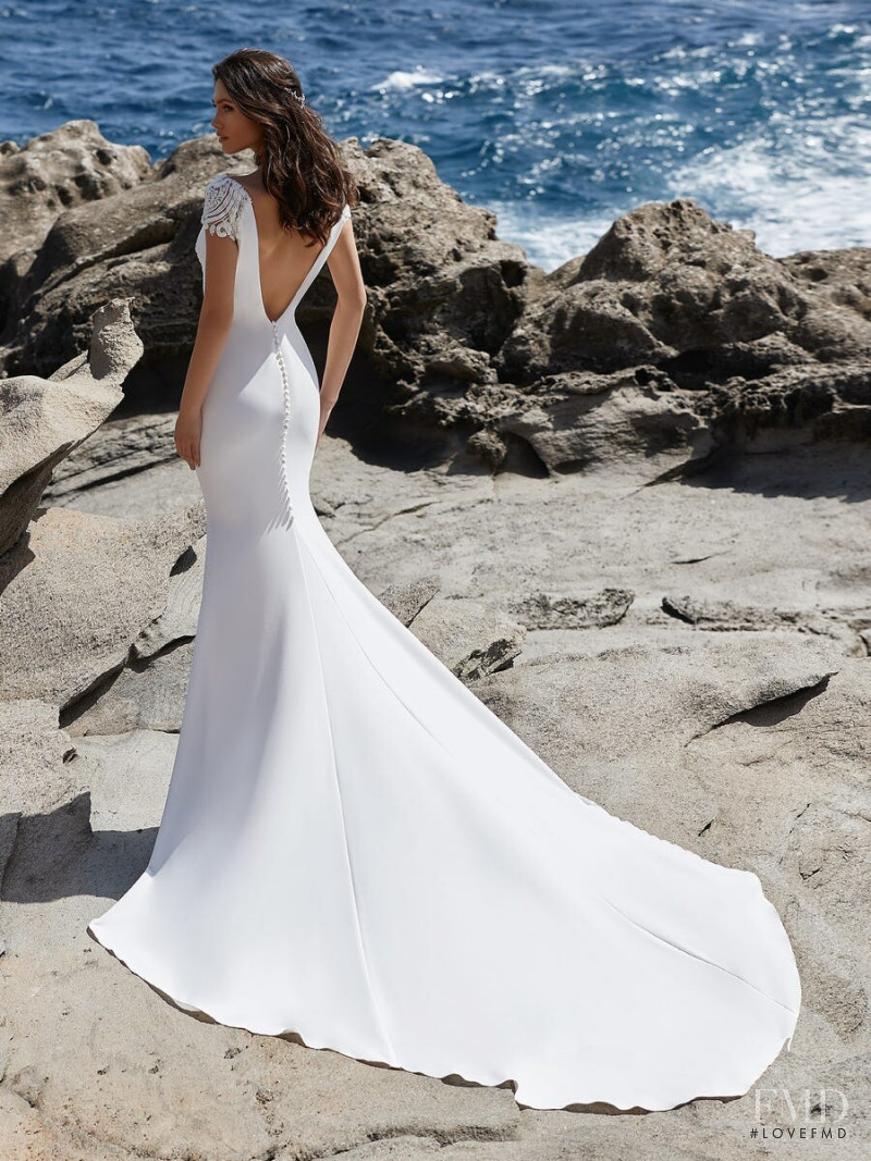 Victoria Bronova featured in  the Pronovias Première Collection II catalogue for Autumn/Winter 2020