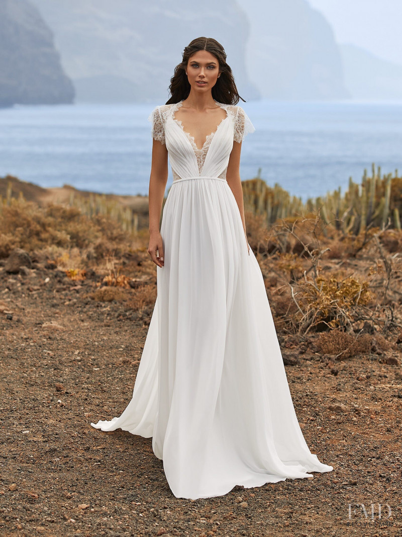 Victoria Bronova featured in  the Pronovias Première Collection II catalogue for Autumn/Winter 2020