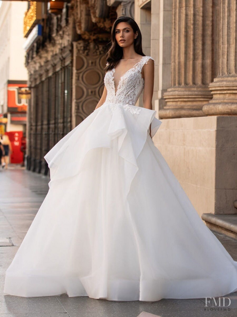 Victoria Bronova featured in  the Pronovias Première Collection II catalogue for Autumn/Winter 2020